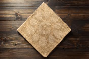 hessian burlap napkin on wooden background