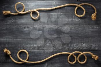 ship rope at wooden background texture