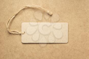 price label at wooden background texture surface