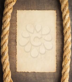 ship rope at wooden background surface