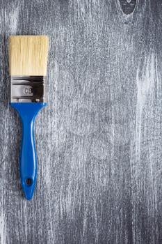 paint brush on wooden painted background texture