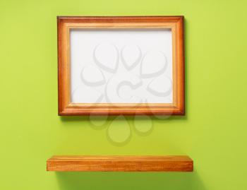 picture frame and shelf at wall background surface
