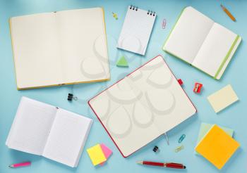 notebook and pen at abstract background surface