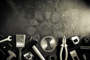 set of tools and instruments on black background