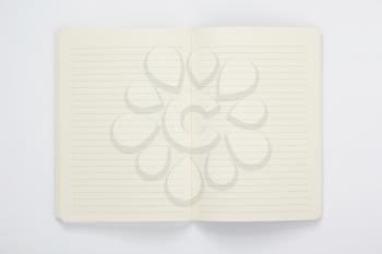 notebook at white paper background
