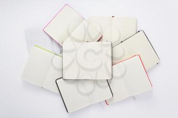 paper notebook at white background, top view