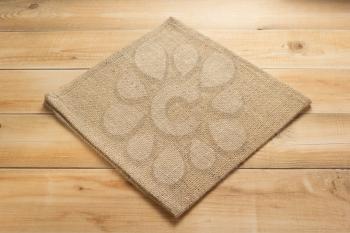 burlap hessian sacking cloth on wooden background table