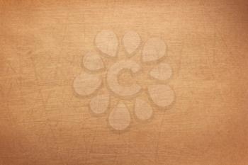 paper or wooden scratched surface as background texture