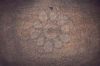 scratched wooden board background as texture surface