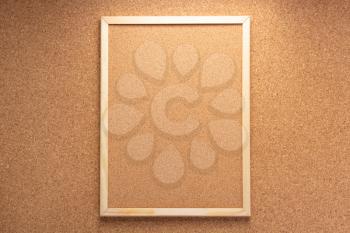 corkboard frame on cork background texture