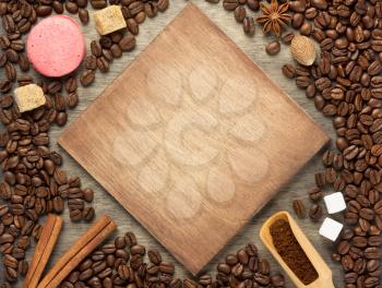 coffee beans on wooden background, top view