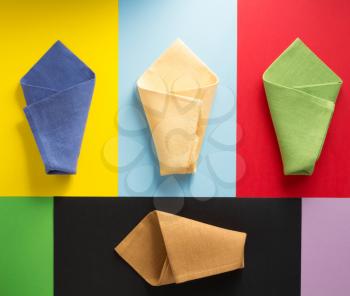 folded napkin at abstract colorful background