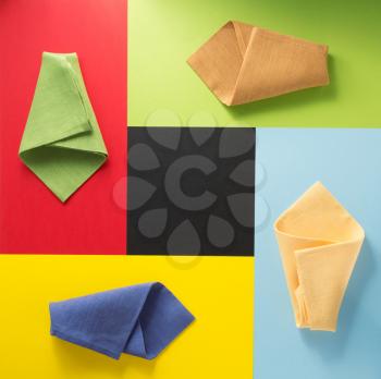 folded napkin at abstract colorful background