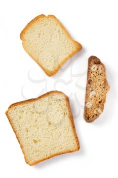 sliced bread and cookies isolated on white background