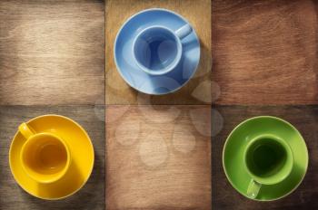 empty cup and saucer at wooden background