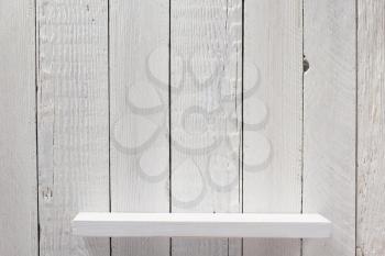 white shelf on wooden wall background texture