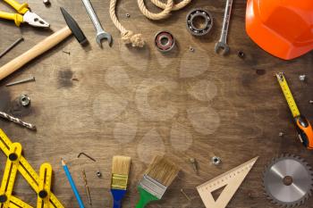set of tools and instruments at wooden background