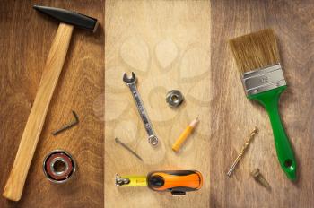 set of  tools and instruments on wooden background