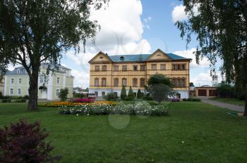 Diveevsky monastery. The administrative building of the Church. Beautiful flower beds near the building.
