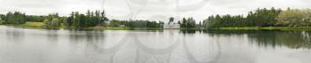 Panoramic view on the lake in Catherine Park of Tsarskoye Selo about the city of St. Petersburg, Russia.
