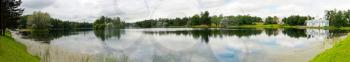 Panoramic view on the lake in Catherine Park of Tsarskoye Selo about the city of St. Petersburg, Russia.