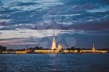 Night shooting from the motor ship during the White nights, a view of the Peter and Paul Fortress and the Cathedral sacred Peter and Pavel in the city of St. Petersburg.