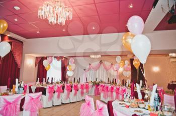 Beautifully decorated room for carrying out wedding.