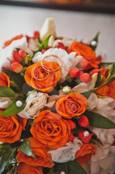 Orange bouquet from the flowers interwoven into it.