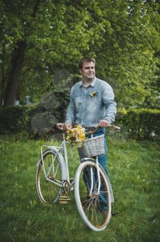 The man with a beautiful bicycle.