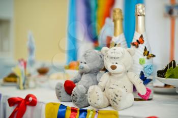 Teddy toy bears on a festive table.