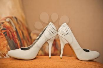 White shoes on a high heel.