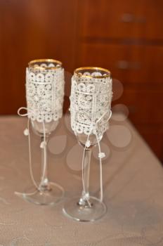 Beautiful transparent glasses decorated with an embroidery and pearls.
