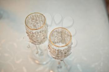 Beautiful transparent glasses decorated with an embroidery and pearls.