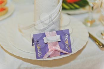 Ornaments of the napkins on the festive table.