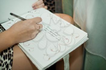 The wedding book for record of desires from guests to the newly-married couple.