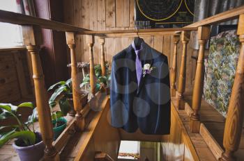 Wedding suit on a hanger.