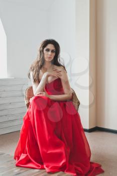 Girl in a red ball gown.