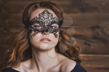 Girl in a black mask.