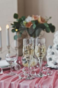 Glasses of champagne on the festive table.
