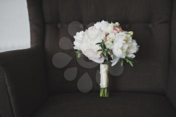 Photo of the bouquet on the big chair.