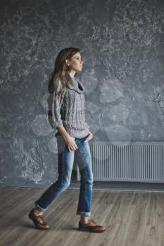 Portrait of girl in blue jeans and jacket.