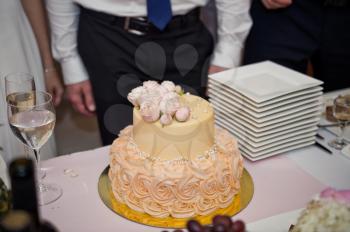 Beige wedding cake.