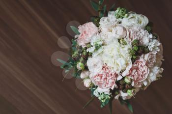 A beautiful delicate bouquet of flowers on the table.