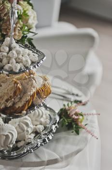 A tiered tray with desserts.