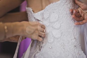 Pinching wedding bridesmaid dresses.