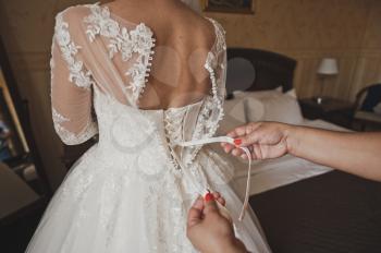 The process of setting the wedding bridesmaid dresses.