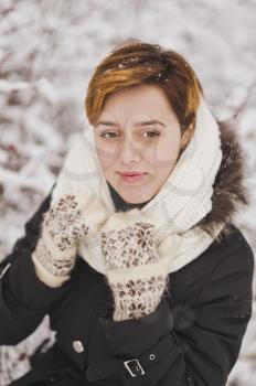 Winter portrait of girl in winter Inist forest.
