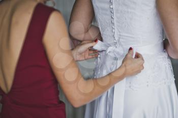 The process of zachorowania wedding dresses.