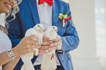 The custom of releasing doves at the ceremony.