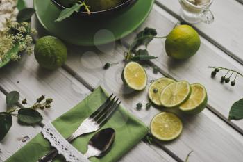 Photo of a lemon on the table sliced.